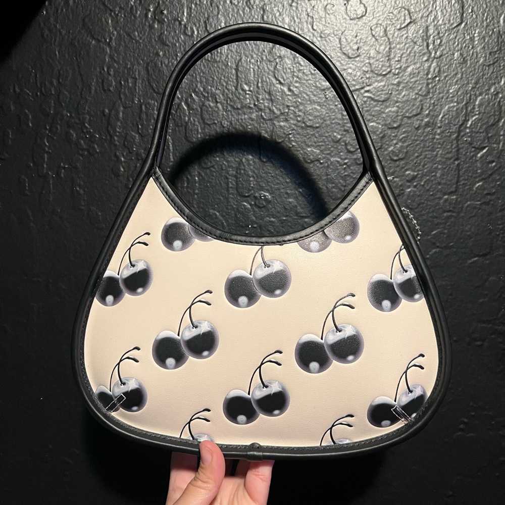 Coachtopia Black Cherry Ergo Bag